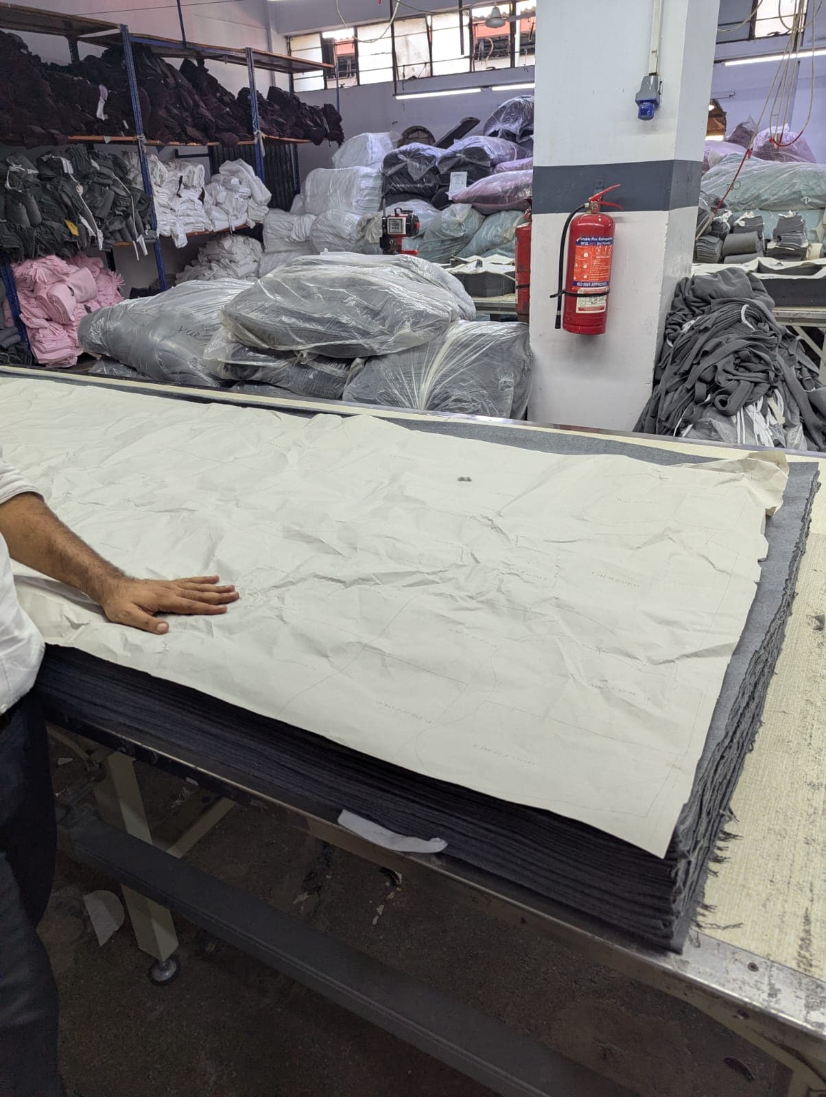 Manual fabric cutting and tracking process at Zaco's factory before digitization
